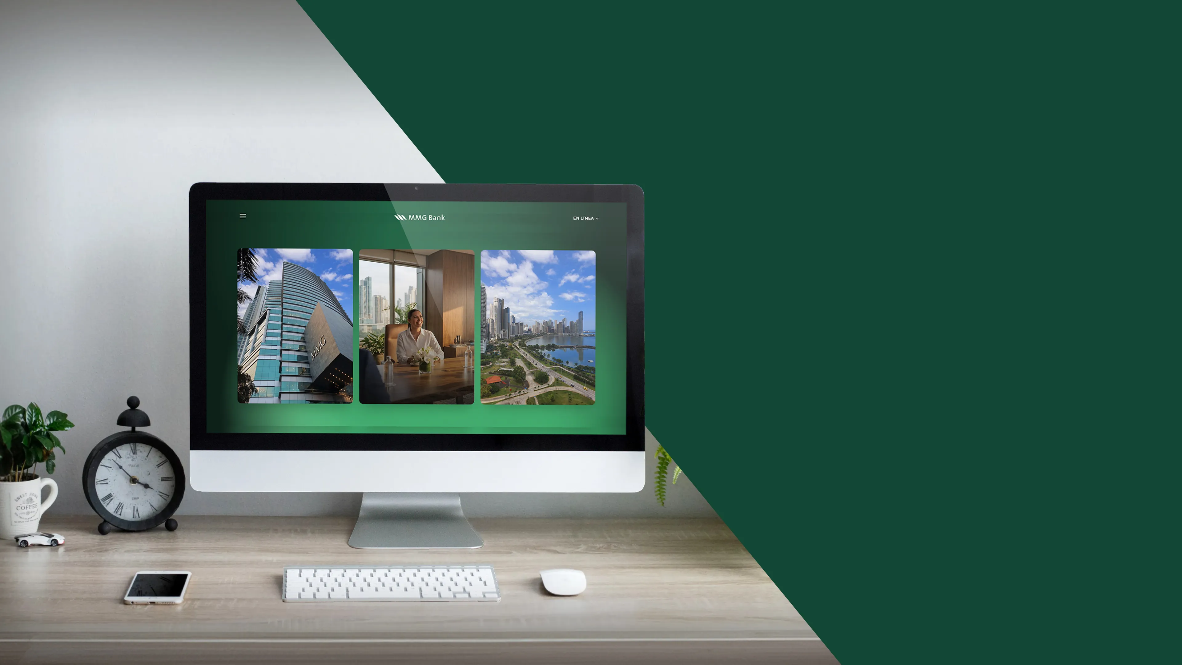 Sitio web de MMG Bank mostrado en un iMac sobre un escritorio de madera